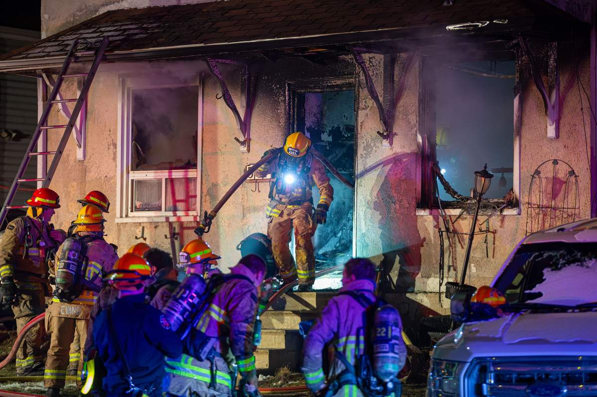 Firefighters battle blaze in deadly fire in Oshawa on Jan. 20, 2025.