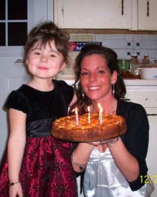 Ashley Burke is seen in an undated photo with her daughter Abigail Robson.