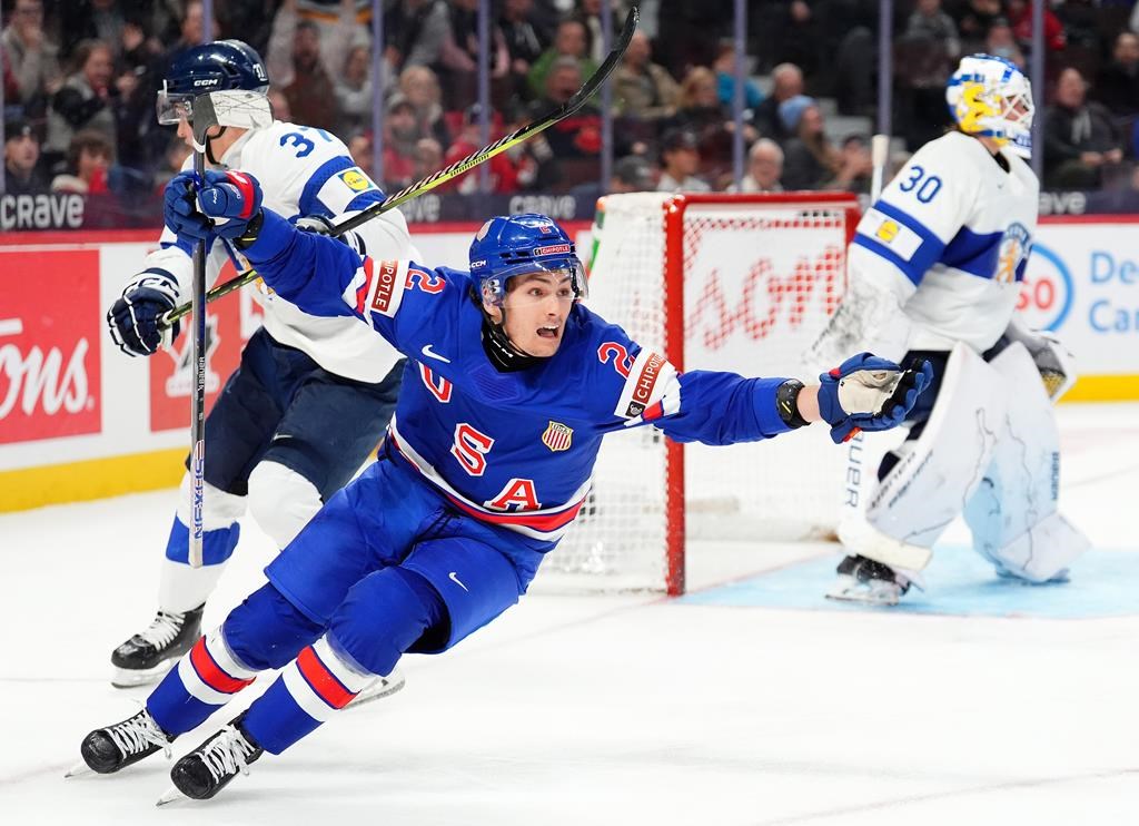 USA forward Teddy Stiga (2) celebrates scoring the game-winning goal on Finland goaltender Petteri Rimpinen (30) to end overtime IIHF World Junior Hockey Championship gold medal game action in Ottawa, Sunday, Jan. 5, 2025.