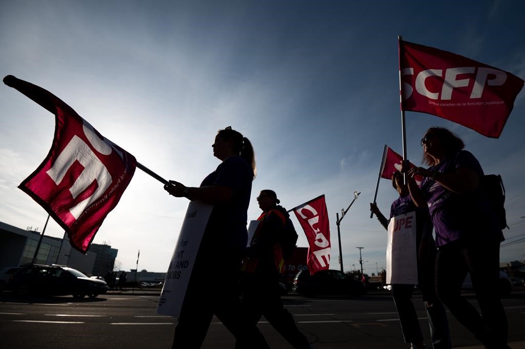 CUPE members and supporters join a demonstration in the east-end of Ottawa on Nov. 4, 2022.