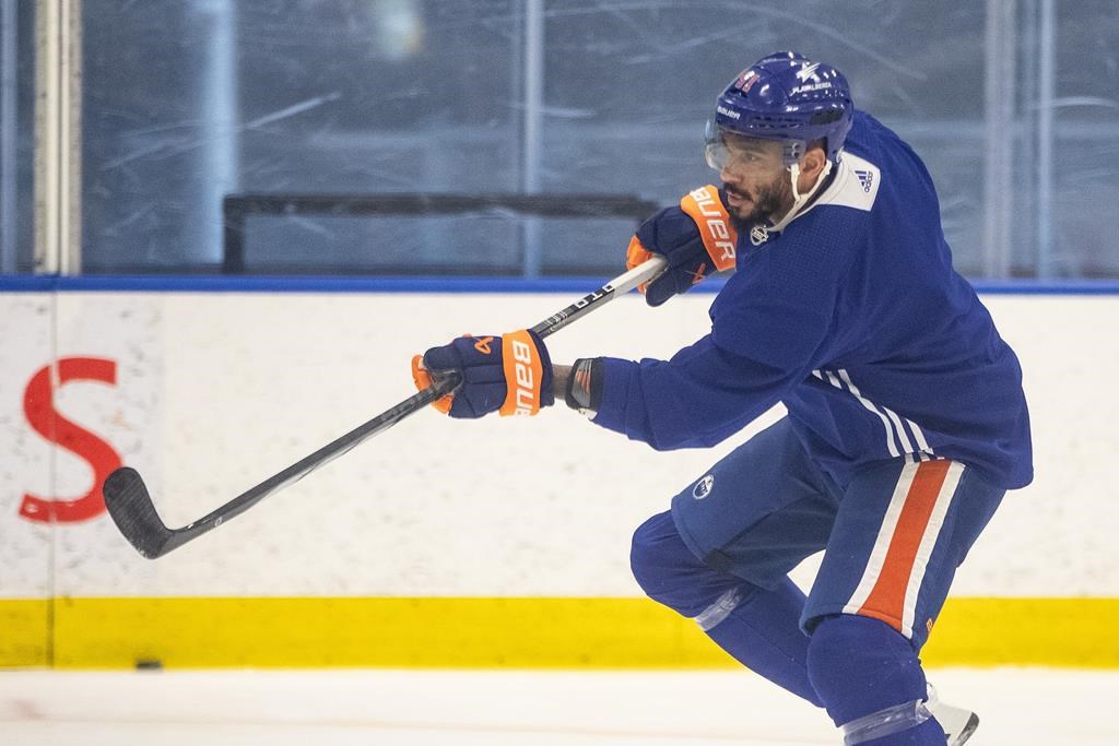 Edmonton Oilers forward Evander Kane (91) takes a shot during practice in Edmonton on Thursday, June 20, 2024.