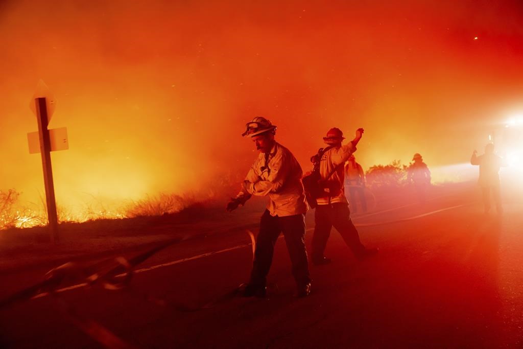 Dangerous winds return to California as wildfires continue to burn