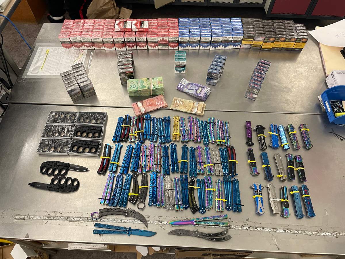 Edmonton police raided Food Mart 97 (10666 97 St.) in the McCauley area on Dec. 17, 2024 and found dozens of prohibited butterfly and spring-assisted knives, along with thousands of illegal cigarettes.