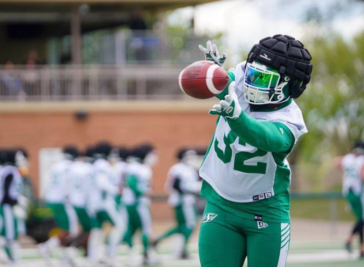 Saskatchewan Roughriders linebacker A.J. Allen (32) catches the football before a spring training scrimmage in Saskatoon on Saturday, May 18, 2024. The Roughriders have signed Allen to a one-year contract extension, the CFL team said Thursday.