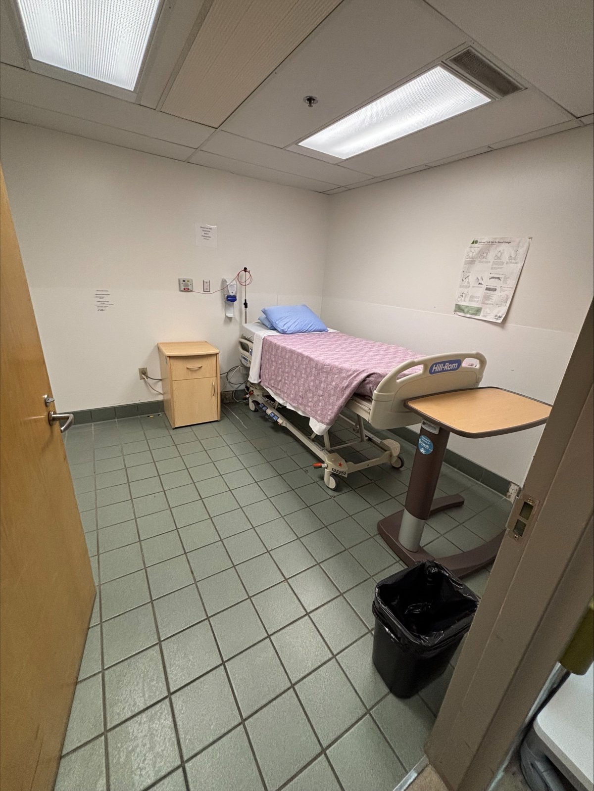 Alberta Health Services has apologized to Ball for giving her a bed in a storage room and says the shelves full of hospital supplies that were in the room have now been moved.