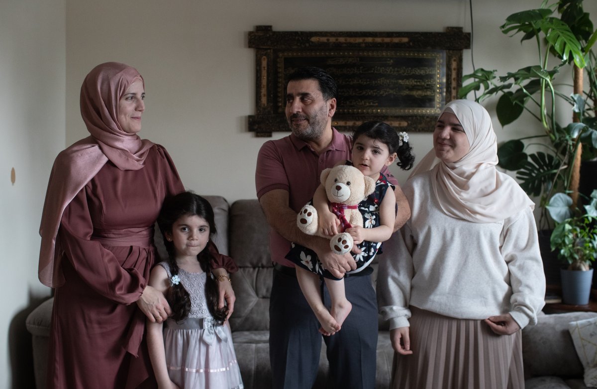 From left, Amani Shamseddin, Selena Moushli, 6, Mahmoud Moushli, Mila Moushli, 2, and Ghena Moushli, 14, pictured at their home in Edmonton, on Wednesday January 1, 2025. 