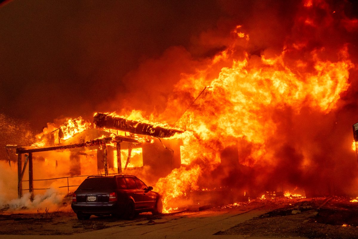 The Eaton Fire engulfs a property Wednesday, Jan. 8, 2025 in Altadena, Calif.