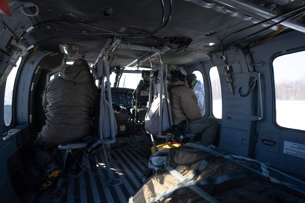 Royal Canadian Mounted Police (RCMP) officers prepare for a flight in a new Black Hawk helicopter to be used for border patrol in St-Antoine-Abbe, Que. on Thursday, Jan.30, 2025.