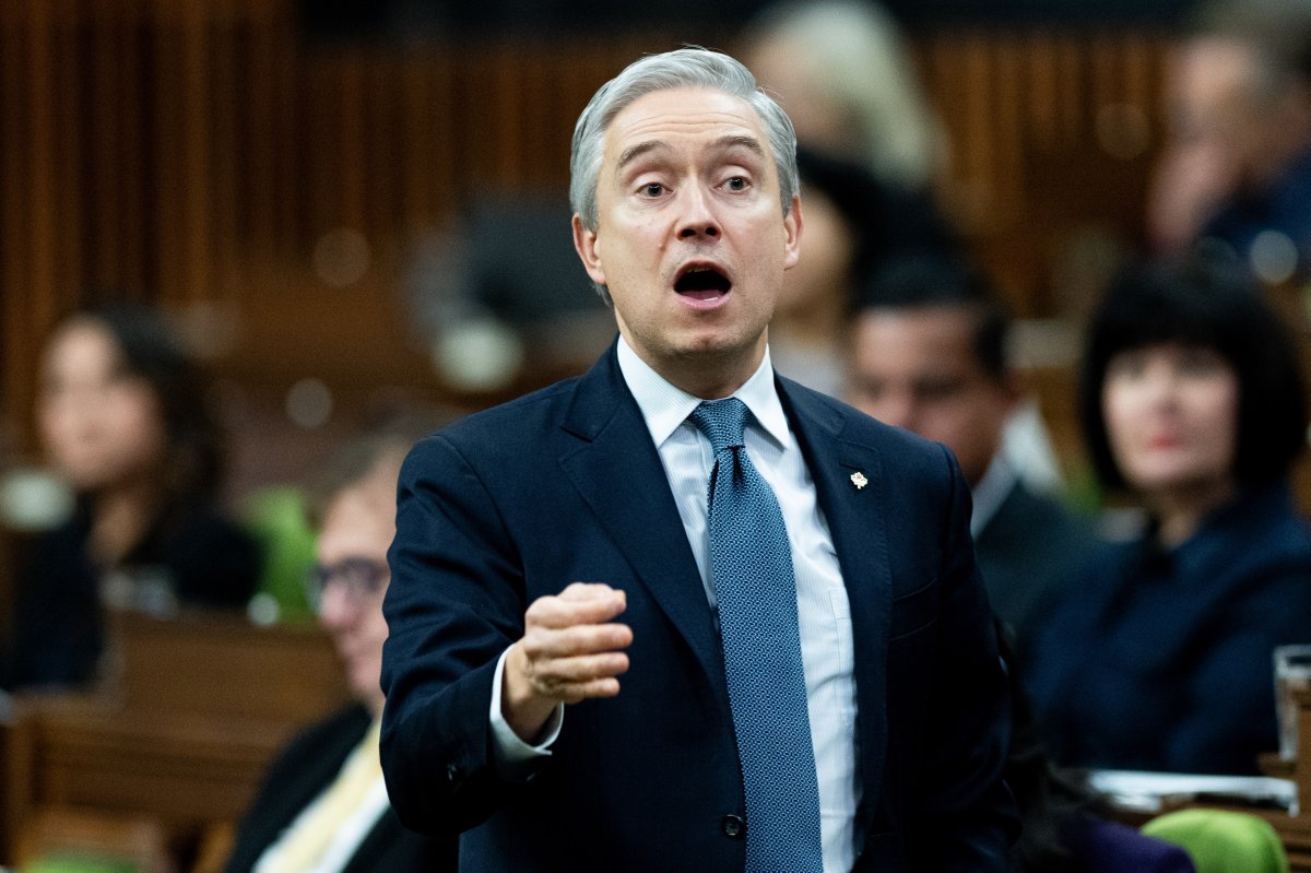 Minister of Innovation, Science and Industry François-Philippe Champagne rises during Question Period in the House of Commons on Parliament Hill in Ottawa, on Thursday, Dec. 12, 2024.