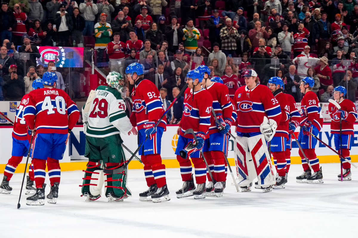 Marc-Andre Fleury of the Minnesota Wild is greeted by the Montreal Canadiens after the game at Bell Centre on Jan. 30, 2025 in Montreal, Quebec.