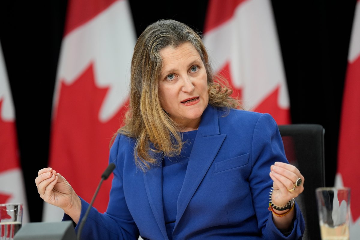 Chrystia Freeland speaks with reporters