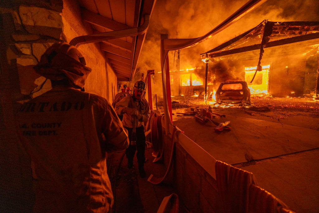 Firefighters battle the Eaton Fire on January 8, 2025 in Altadena, Calif.