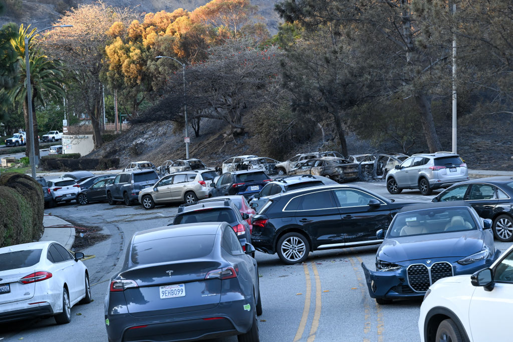 A view of abandoned and burned cars on Sunset Blvd. in Pacific Palisades during 'Palisades Fire' in Los Angeles, Calif., on January 12, 2025.