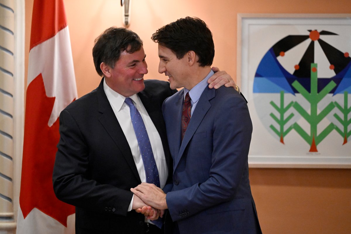 Prime Minister Justin Trudeau congratulates Dominic LeBlanc after he was sworn in as Finance Minister at a swearing in ceremony at Rideau Hall, in Ottawa, Monday, Dec. 16, 2024.