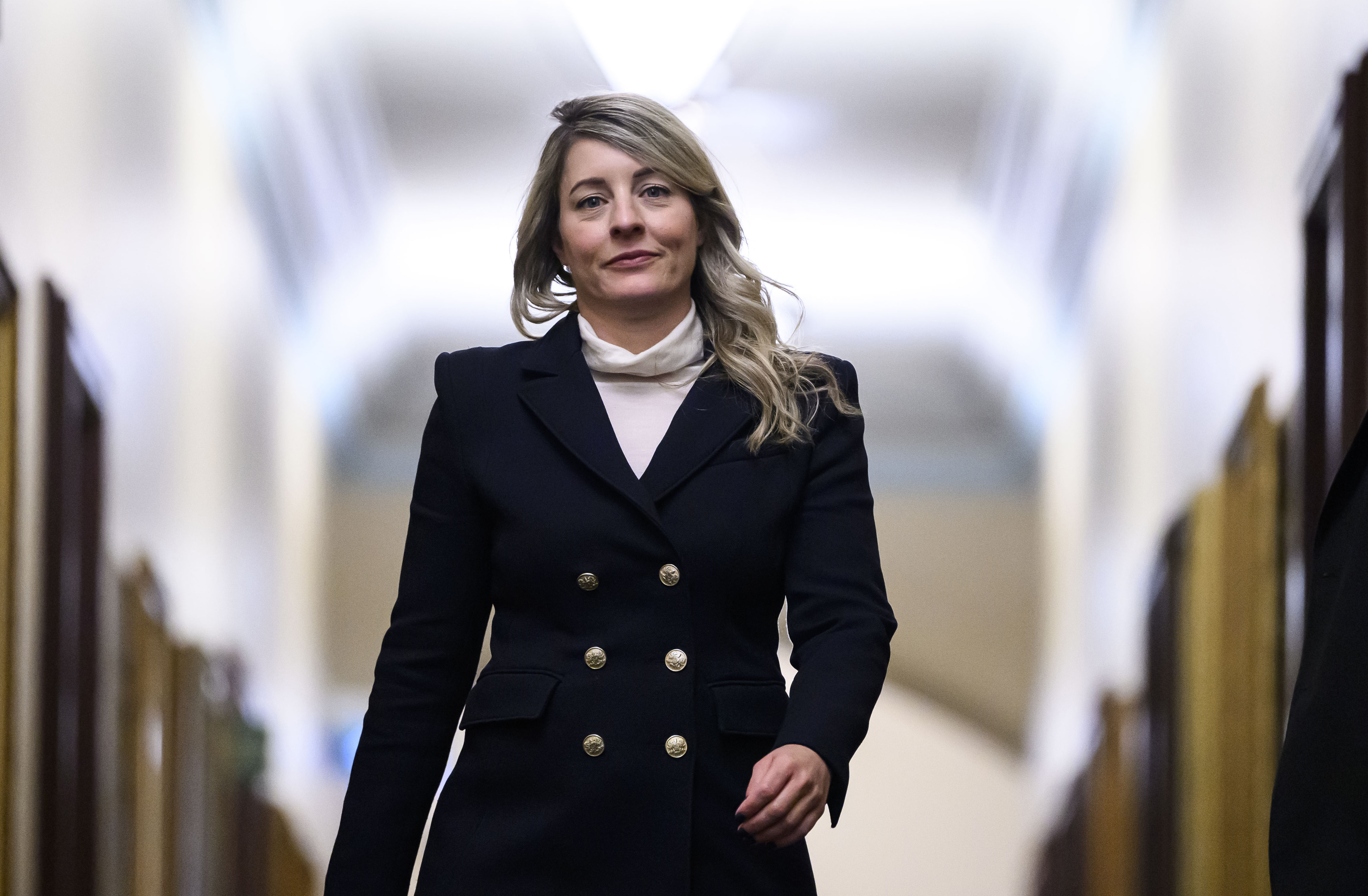 Minister of Foreign Affairs Melanie Joly returns to a Liberal Party caucus meeting in West Block on Parliament Hill, in Ottawa, Wednesday, Jan. 8, 2025.