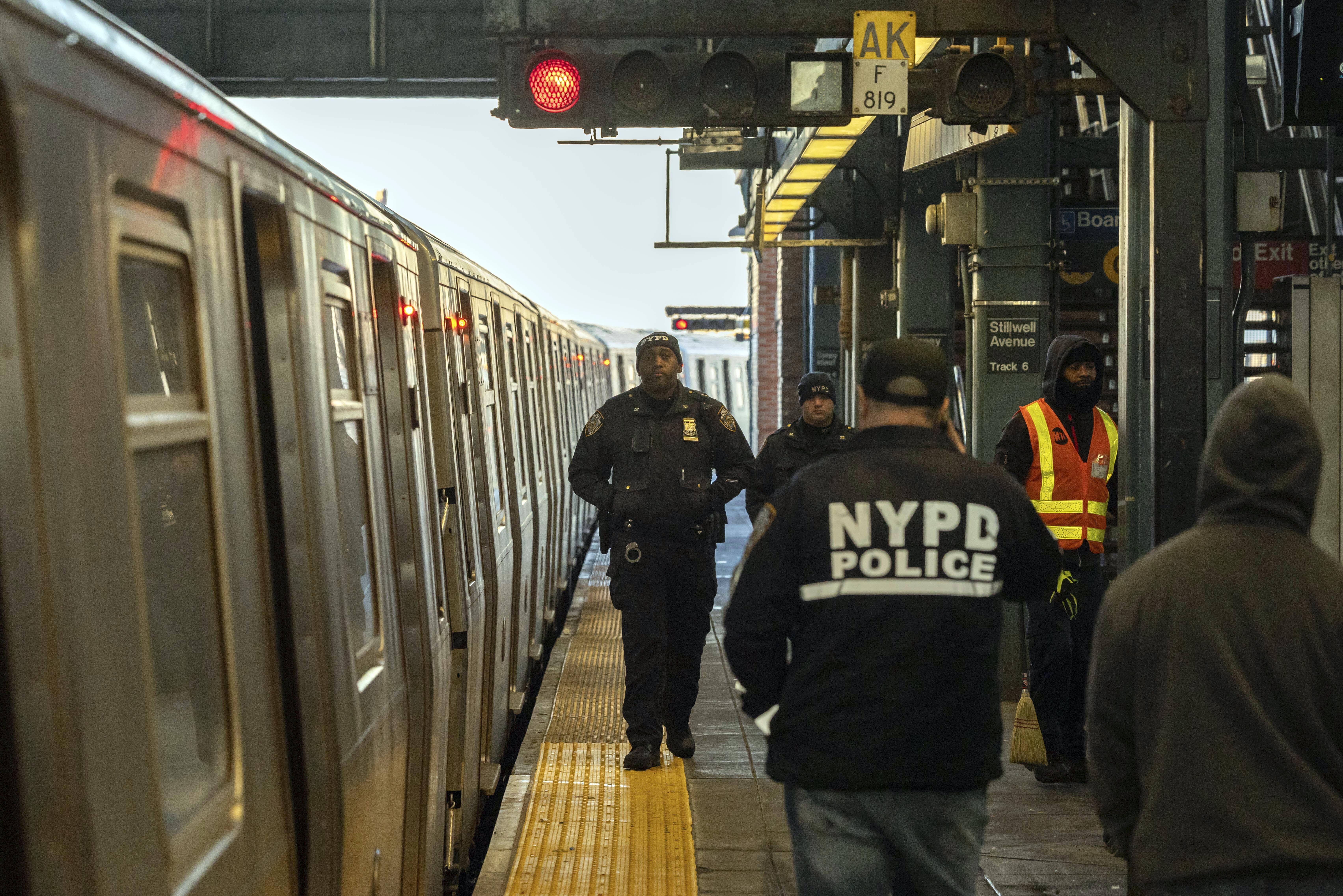 Man pushed onto NYC subway tracks recovering, suspect charged