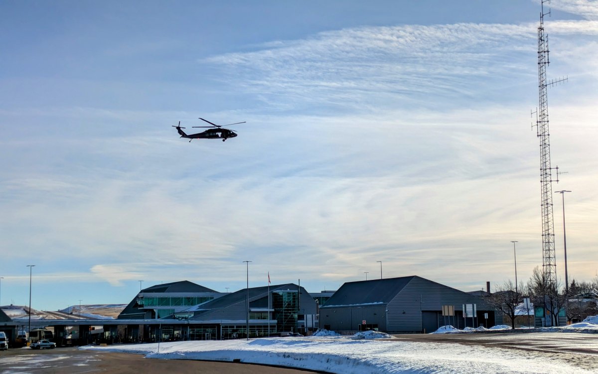 A RCMP Black Hawk helicopter over the Coutts Border Crossing in southern Alberta on Tuesday, January 28, 2025.