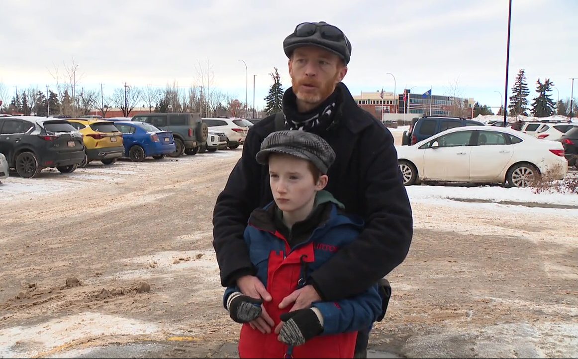 Martin Doyle and his son Ryan Doyle, who has severe autism, speaking to Global News on Jan. 22, 2025 about how their lives have been disrupted by the strike between CUPE staff and Edmonton Public Schools.