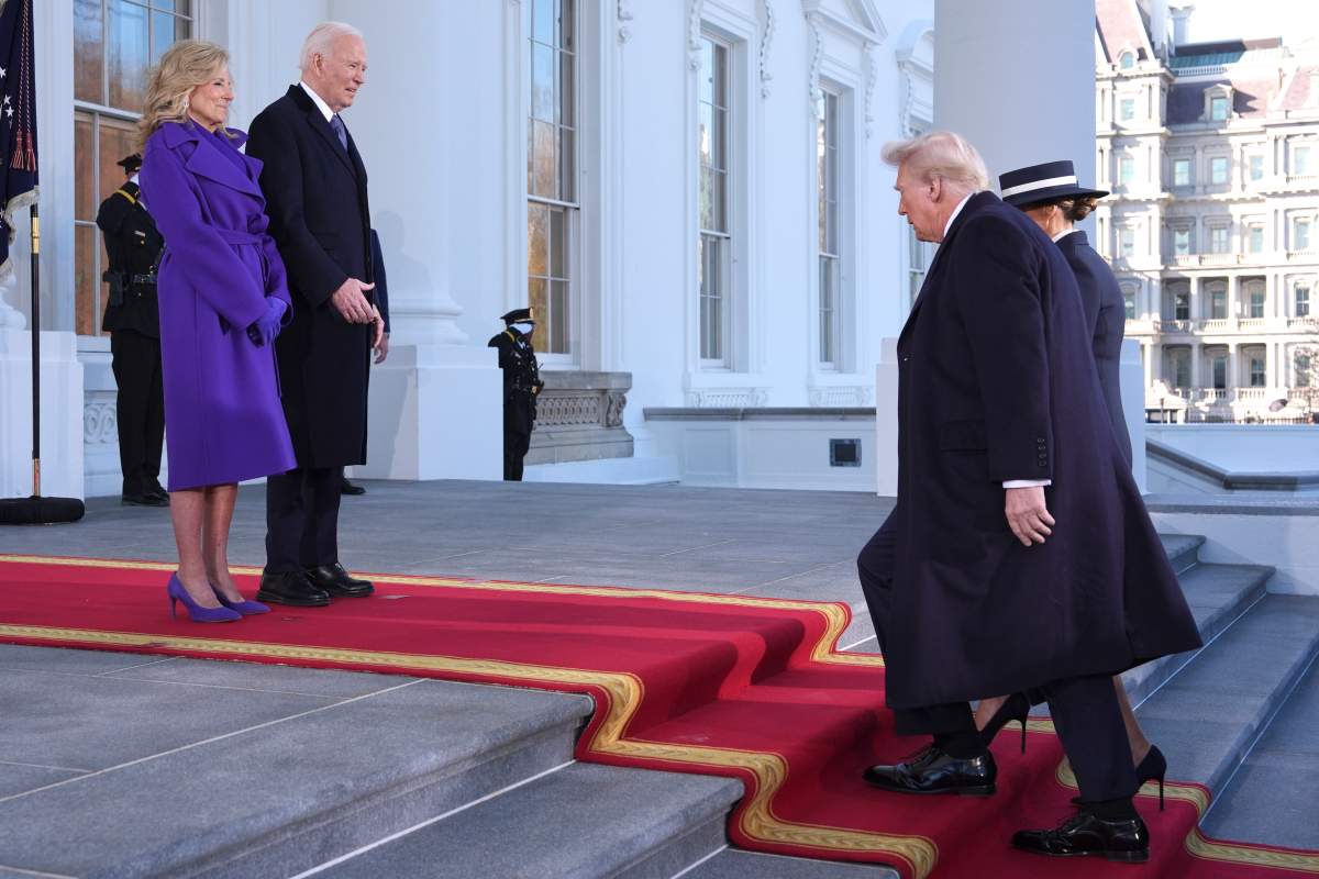 President Joe Biden, center left, and first lady Jill Biden, left, greet President-elect Donald Trump, center right, and Melania Trump, right, upon arriving at the White House, Monday, Jan. 20, 2025, in Washington.