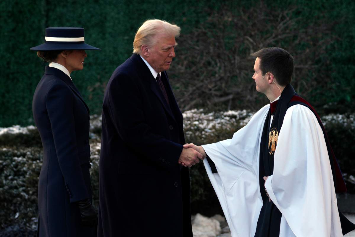 President-elect Donald Trump and his wife Melania are greeted as they arrive for church service at St. John's Episcopal Church across from the White House in Washington, Monday, Jan. 20, 2025, on Donald Trump's inauguration day.