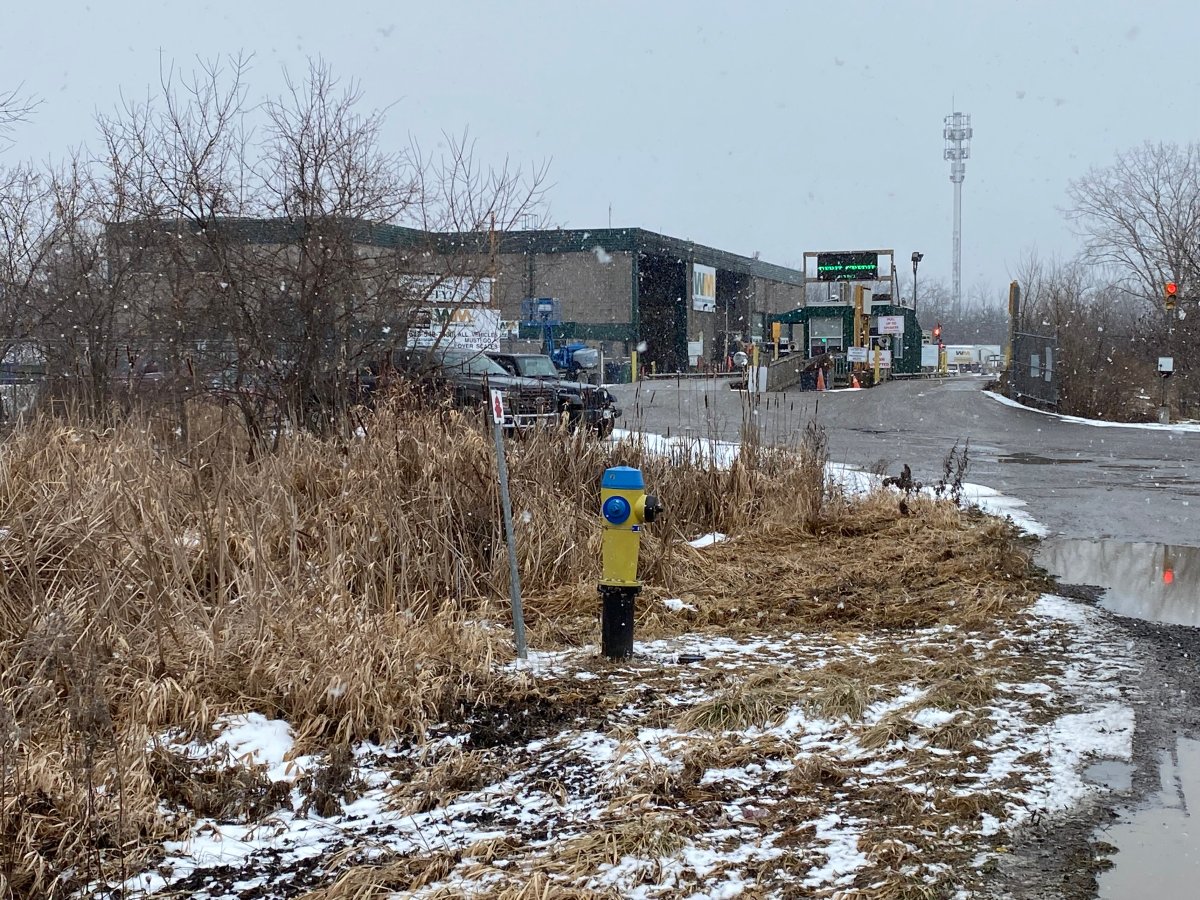 Live grenade found in Kingston waste facility’s scrap metal bin prompts evacuation. OPP safely disposes of it. Investigation into origins underway.