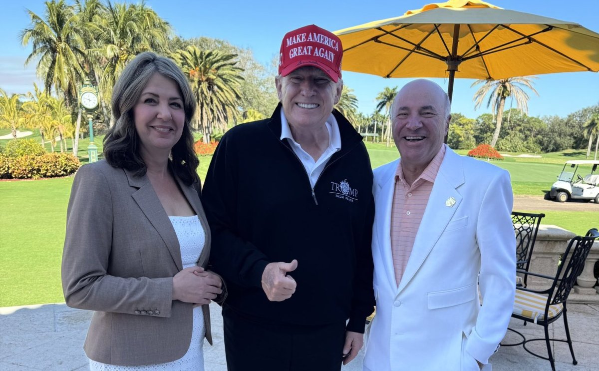 Alberta Premier Danielle Smith poses with president-elect Donald Trump and businessman Kevin O'Leary during her visit to Florida earlier this month, prior to Trump's inauguration.