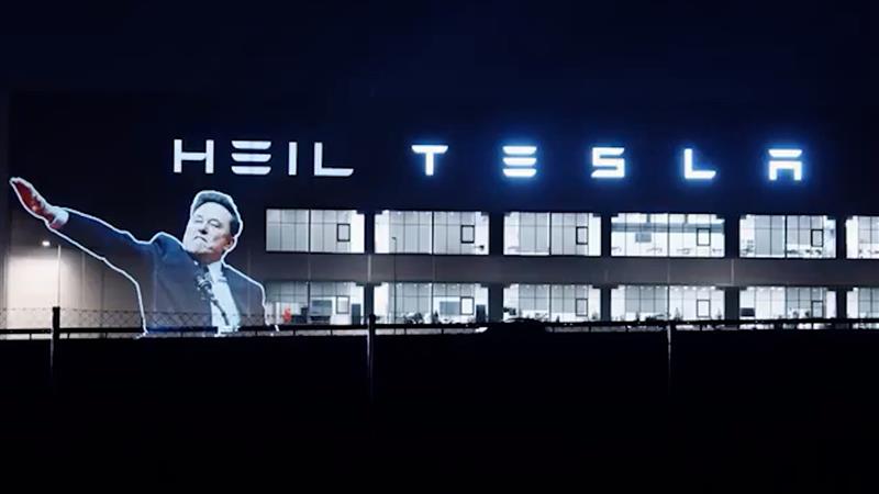 Heil Tesla: Elon Musks salute projected onto carmakers factory in Germany