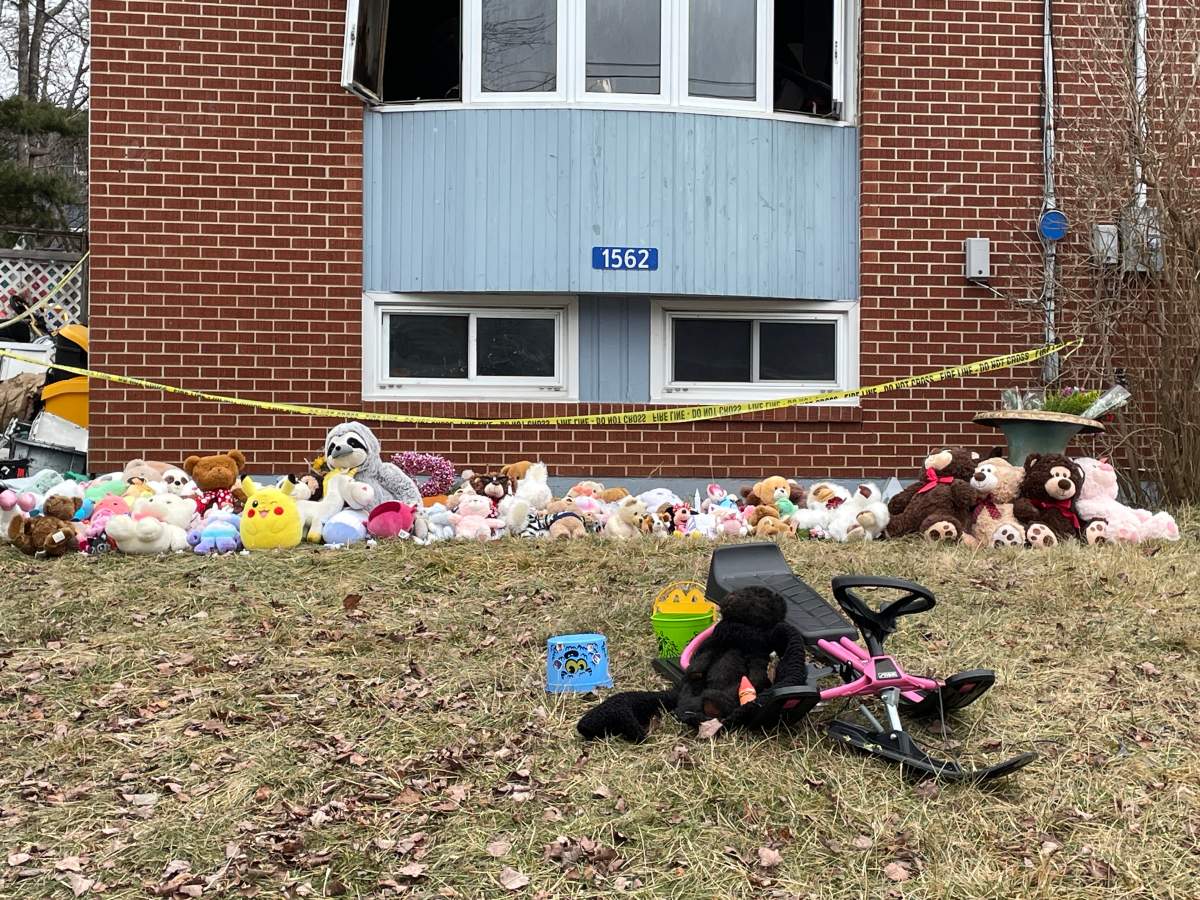 A vigil has grown at the home in Lower Sackville where a fatal fire happened this weekend.