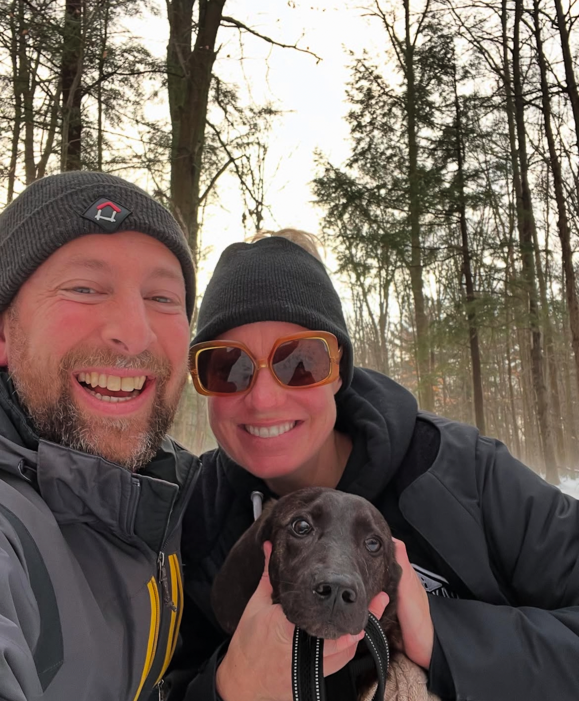 Nicole Brickell and her husband with there new dog Charlie from the Orillia SPCA.