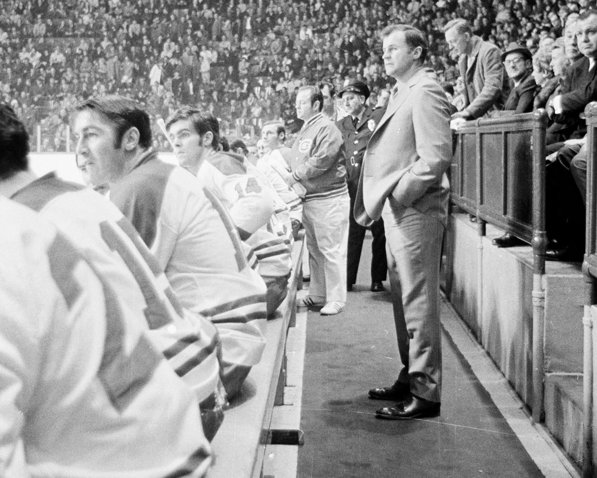 Head Coach Al MacNeil of the New Montreal Canadiens follows the action from the bench at the Montreal Forum in 1970.  MacNeil won his first Stanley Cup as head coach of the Canadiens in 1971.  (Photo by Denis Brodeur via Getty Images)