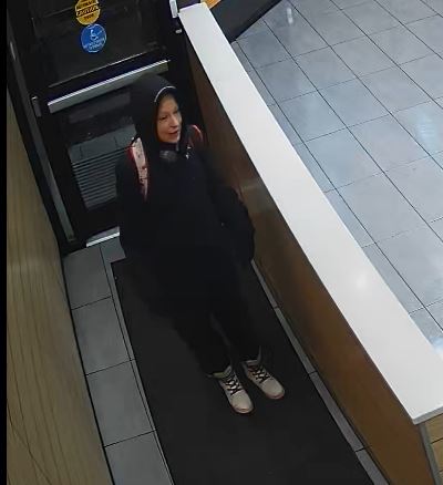 Calgary police have released photos of three suspects, including this woman, wanted in connection with the fatal assault of a man in downtown Calgary on Sunday, Jan. 12, 2025.