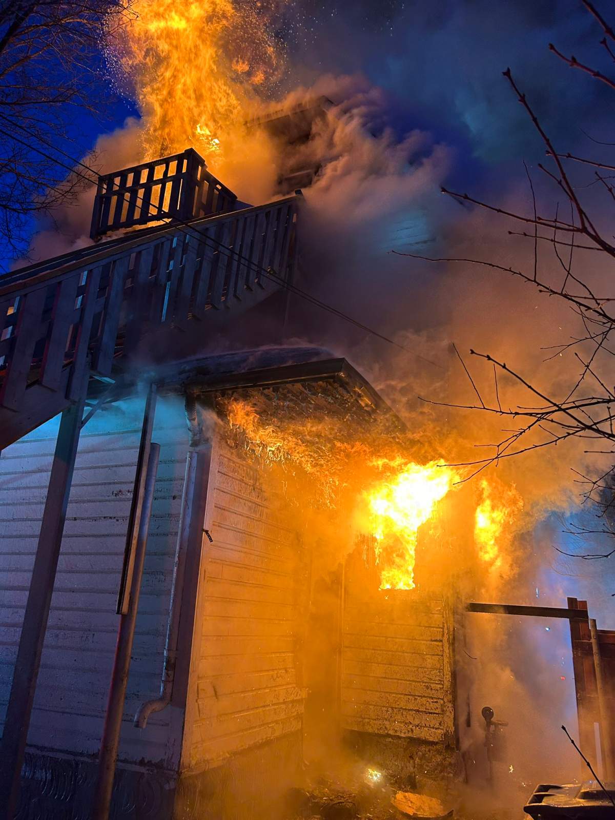 Flames shoot from a vacant home in Winnipeg overnight. 