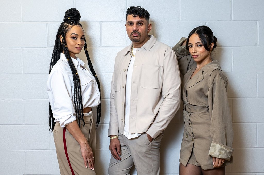 Film director Ron Dias, centre, with actors Joanne Jansen, left, and Kiana Madeira, right, pose for a portrait in downtown Toronto, Thursday, February 20, 2025. Dias’ latest film Morningside tells the powerful story of a tight-knit Toronto community facing the forces of gentrification.  THE CANADIAN PRESS/Eduardo Lima.