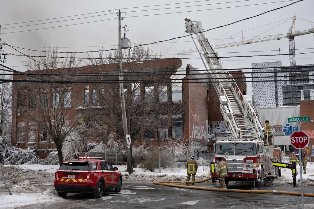 Firefighters work to put out a fire that destroyed a building at the former Bloomfield School in Halifax’s north end on Sunday, Feb. 16, 2025. The building, which caught fire early Sunday morning, has been a point of contention with the city and policy makers following failed plans for redevelopment and complaints the site was a safety risk. 
