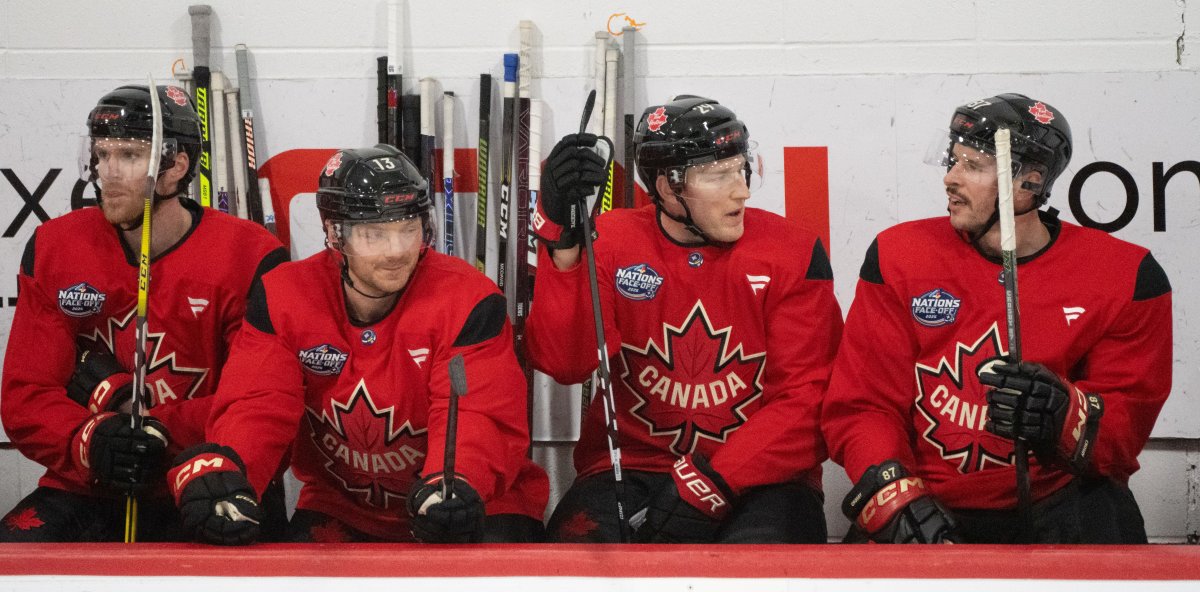 Canada players (left to right) Connor McDavid, Sam Reinhart, Nathan MacKinnon and Sidney Crosby talk on the bench during 4 Nations Face-Off hockey practice in Montreal on Monday, Feb. 10, 2025. Canada will face Sweden on February 12.