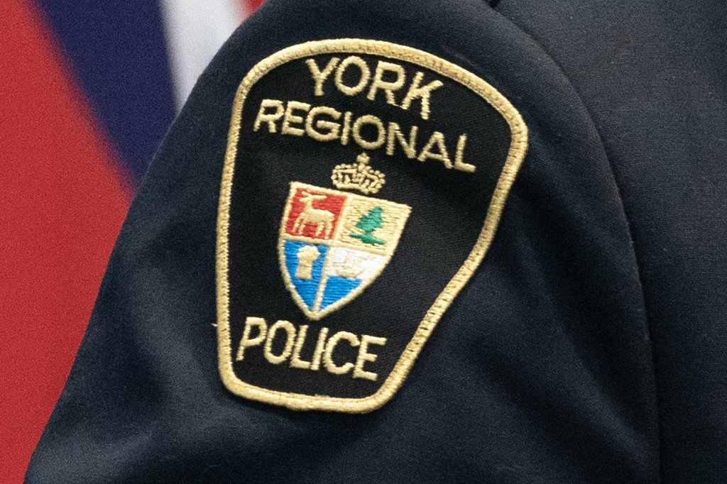 York Regional Police have identified the victim of a fatal late-night restaurant fire north of Toronto and downgraded a murder charge against the alleged arsonist. A York Regional Police patch is shown in Aurora, Ont. on Dec. 19, 2022. THE CANADIAN PRESS/Arlyn McAdorey.