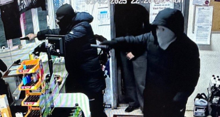 Manitoba RCMP are looking to identify a group of men captured on surveillance footage during a gas station robbery.