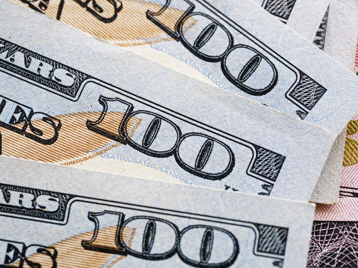 a pile of US$100 bills