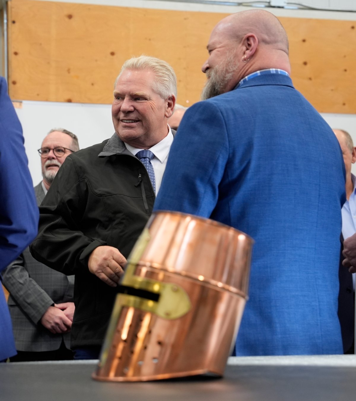 Ontario PC Leader Doug Ford speaks with union leadership as he makes a campaign stop at a sheet metal workers union and training facility, in Ottawa, Tuesday, Feb. 4, 2025.