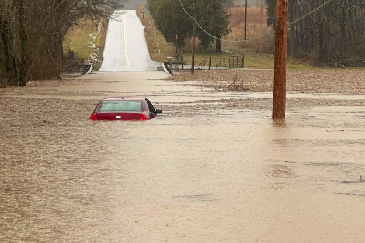 This photo provided by the Warren County, Ky., Sheriff's Office shows a partially submerged car outside of Bowling Green, Ky., on Saturday, Feb. 15, 2025.