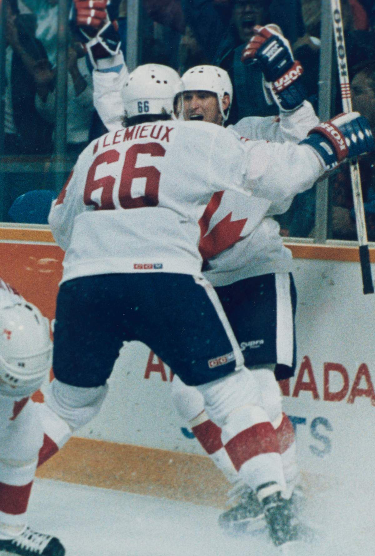 Mario Lemieux rushes into the arms of teammate Wayne Gretzky after scoring the game-winner in the Canada Cup final match against the Soviet Union, Hamilton, Ont., Tuesday, Sept. 15, 1987.