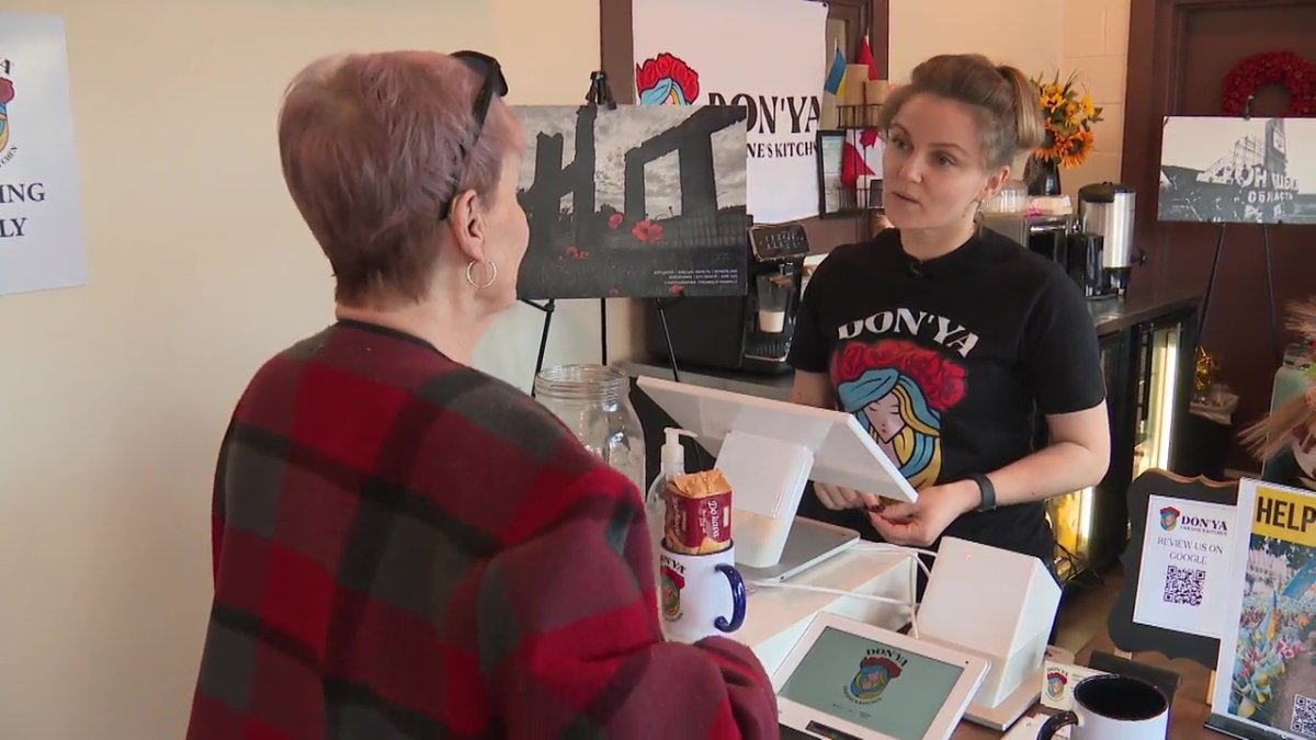 Svitlana Sukhovych serving customers at DON'YA Ukraine's Kitchen (12153 Fort Road) in Edmonton, Alta. on Monday, February 24, 2025.