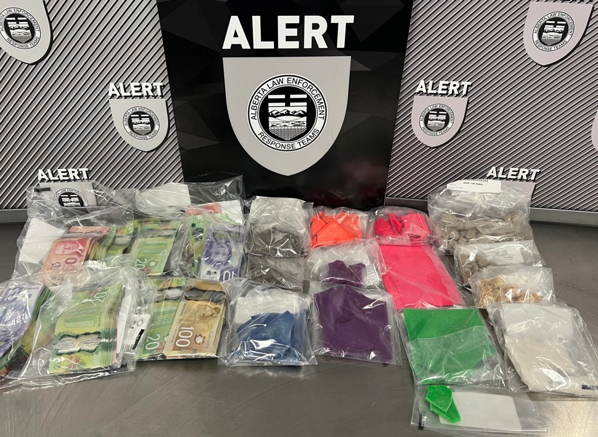 Officers with the Alberta Law Enforcement Response Team (ALERT) have arrested and charged a 29 year old Calgary man after seizing a large amount of fentanyl, cash and other drug paraphernalia from a Beltline apartment.
