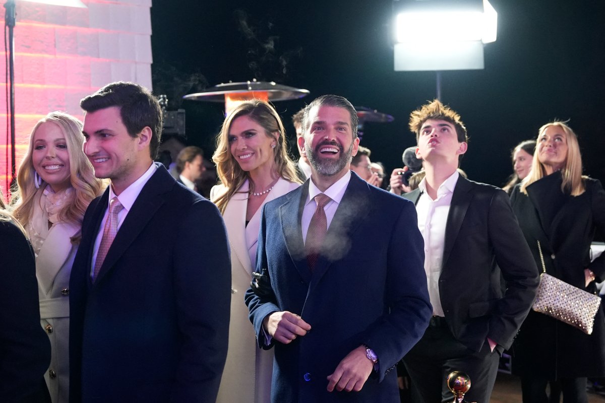 (L-R) Tiffany Trump, her husband Michael Boulos, Bettina Anderson and Donald Trump Jr. walk inside after watching fireworks at Trump National Golf Club Washington DC in Sterling, Virginia, on January 18, 2025.