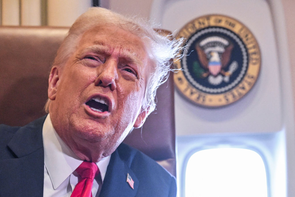 U.S. President Donald Trump speaks to the press before signing a proclamation renaming the Gulf of Mexico as the Gulf of America aboard Air Force One enroute to New Orleans, La., on Feb. 9, 2025.