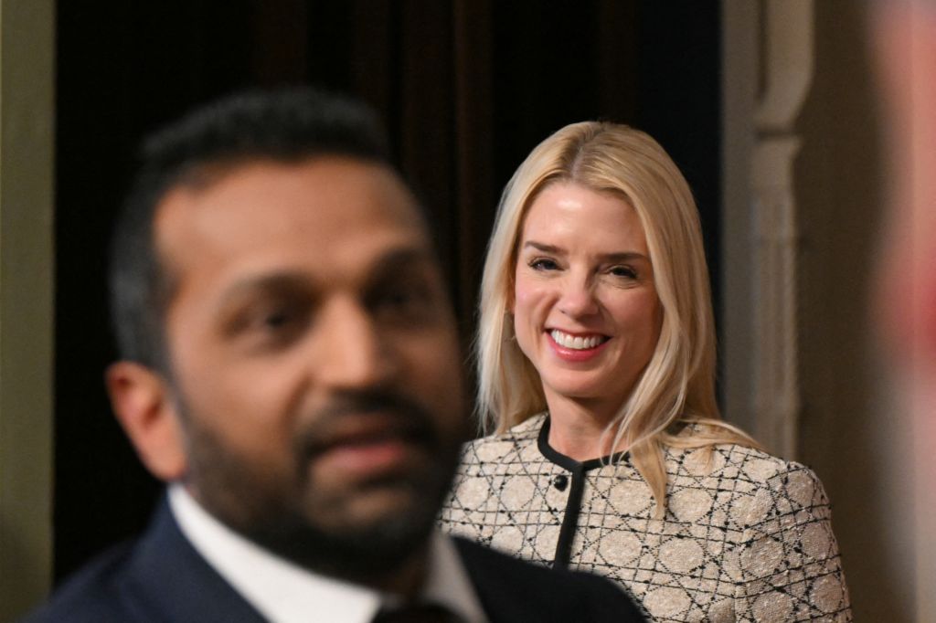 U.S. Attorney General Pam Bondi (R) swears in Kash Patel as FBI Director in the Indian Treaty Room at the Eisenhower Executive Office Building in Washington DC, On February 21, 2025.