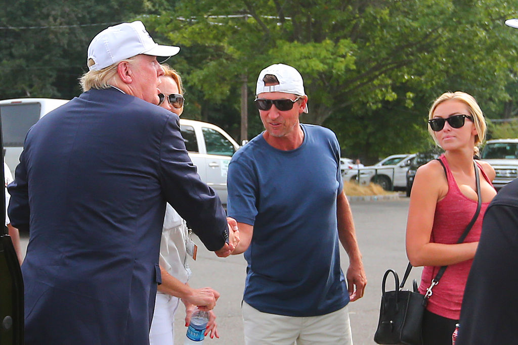 Donald Trump shakes hands with former NHL star Wayne Gretzky before leaving The Barclays at Plainfield Country Club in Edison, N.J.