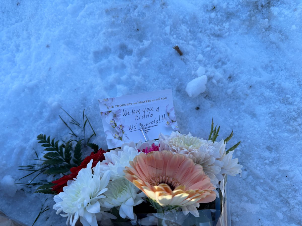 A memorial is growing at the scene of the fatal shooting on Sunday afternoon.