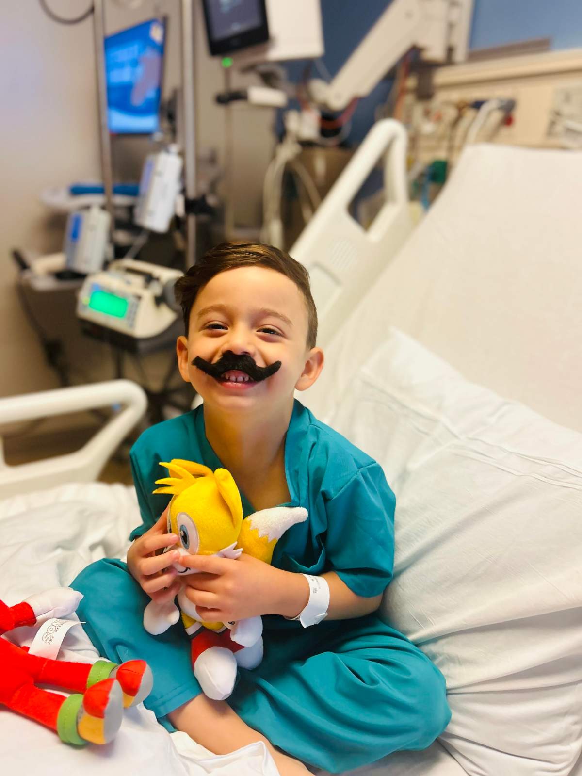 Jakob Guziak in hospital being treated for his rare “bubble boy” disease.