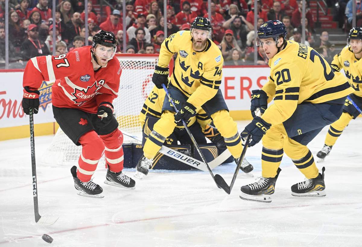 Canada's Connor McDavid (97) and Sweden goaltender Filip Gustavsson, Mattias Ekholm (14) and Joel Eriksson Ek (20) watch the puck during first period 4 Nations Face-Off hockey action in Montreal, Wednesday, February 12, 2025.